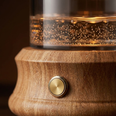 Detail: brass button and glass vessel